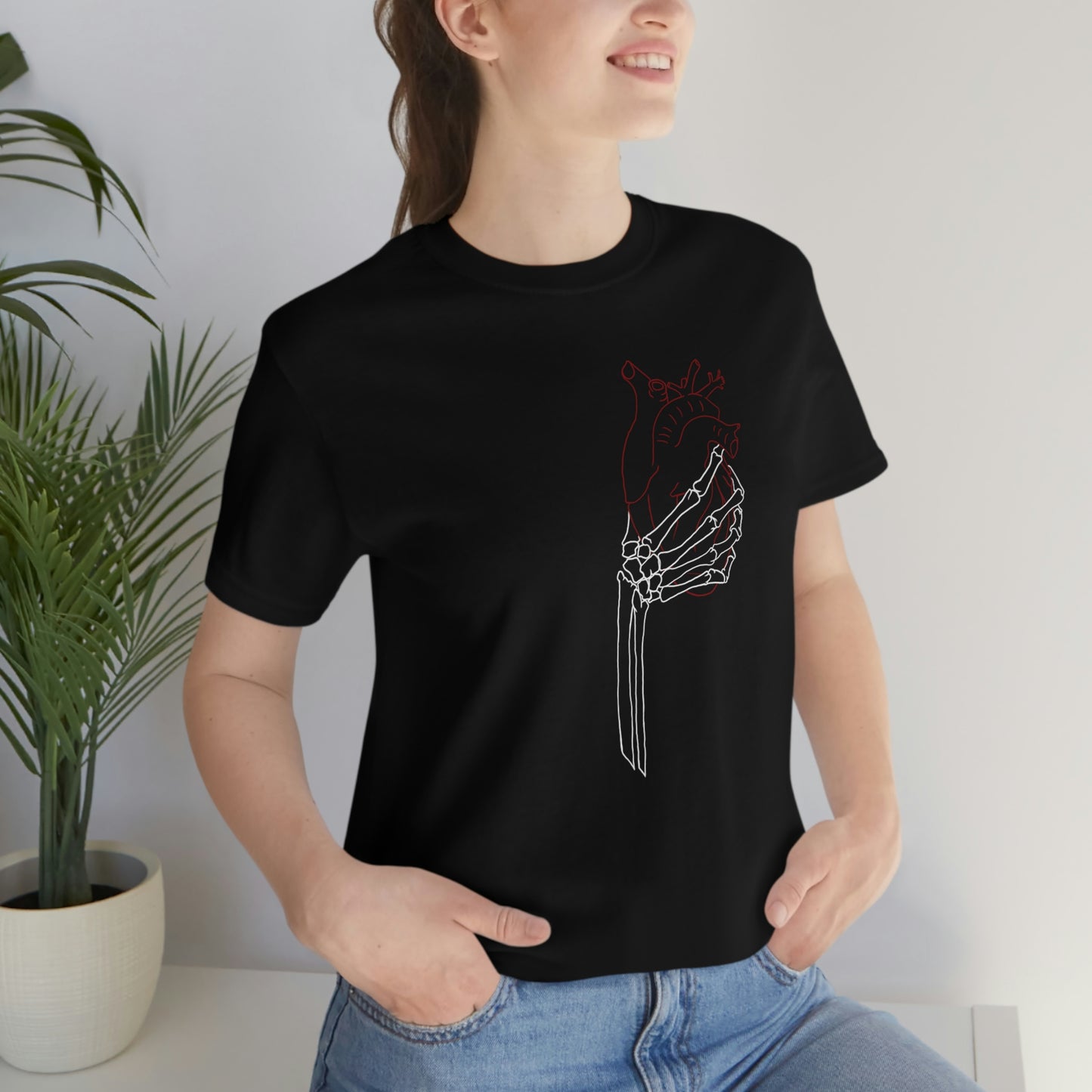 Skeleton hand grabbing Heart Unisex Jersey Short Sleeve Tee